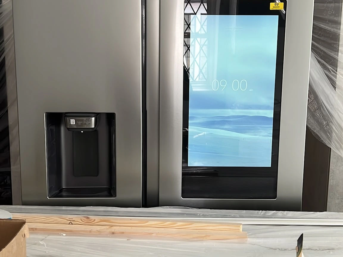 Smart fridge freezer powered up during a kitchen refurbishment